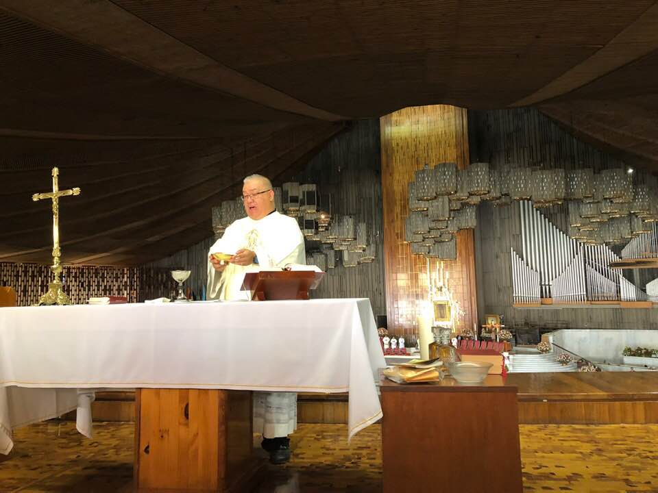 Father Dindo celebrates Mass